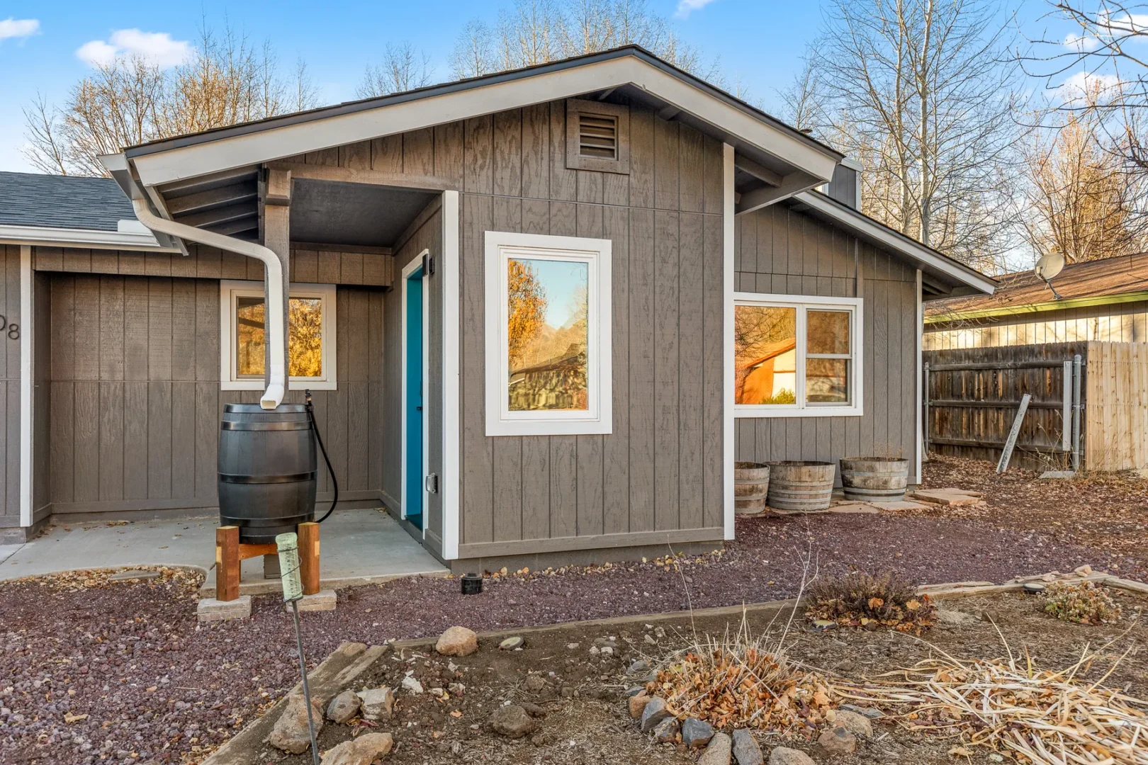 Completed home addition exterior in Cheshire Flagstaff AZ showing new structure integration by Barden Home Builders
