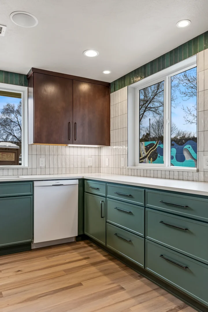 Flagstaff kitchen remodel with custom sage green cabinets, vertical tile backsplash, and quartz countertops by Barden Home Builders